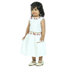 White pure cotton sleeveless dress embellished with tussle