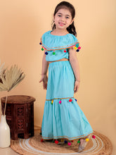 Sky Blue pure cotton crop top and long skirt embellished with pompom tussal